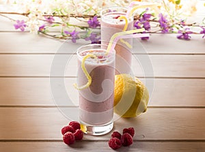 Raspberry milkshake on glass