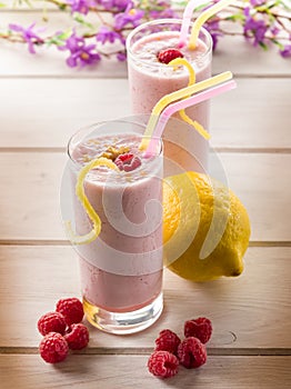 Raspberry milkshake on glass