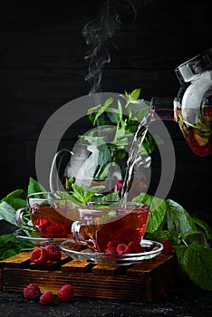 Raspberry and mint tea. Hot winter drinks.
