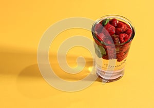 Raspberry Mojito Soda on Yellow Background