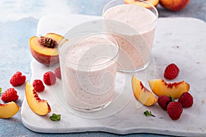 Raspberry peach smoothie, healthy and refreshing drink