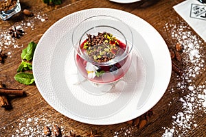 Raspberry-pistachio paradise island. Pistachio cream, raspberry panna cotta, almond-pistachio. Delicious healthy