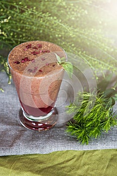 Raspberry smoothie with basil