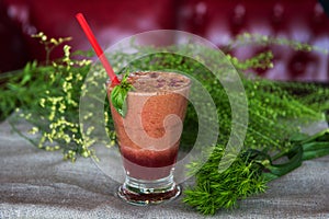 Raspberry smoothie with basil