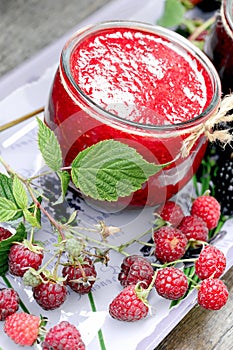 Raspberry smoothie, prepared healthy drink with organic fruit