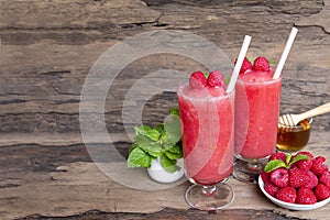 Raspberry smoothie red colorful fruit juice milkshake blend beverage healthy.