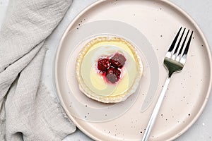 raspberry strawberry whipped creamy tartlets.confection dessert.pastry cheesecake with ripe berries