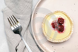 raspberry strawberry whipped creamy tartlets.confection dessert.pastry cheesecake with ripe berries