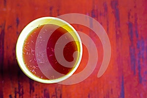 raspberry tea with apricot eclair.