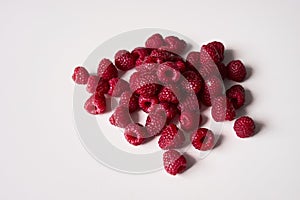 Raspberry on a white background, close-up red