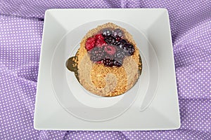 Raspberry white chocolate cake. Close up of mini cheesecake with white chocolate and raspberries. a piece of cake with chocolate