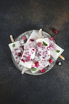 Raspberry and yogurt popsicles