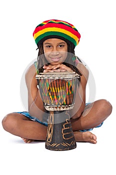 Rasta kid sitting on the floor