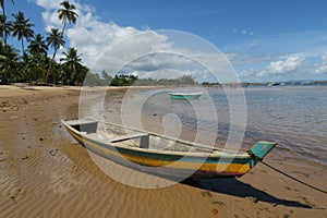 Rastafari multicolored fishing boat near Ponta do Muta beach, Barra Grande, Marau Peninsula, Brazil photo