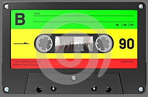 Rastafarian colored audio cassette with sticker and label