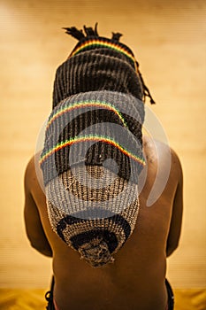 rastafarian man showing his dreadlocks