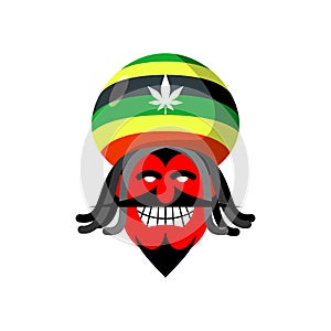Rastaman devil. Rasta cap and dreadlocks. Satan for Rastafarians photo