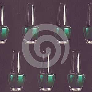 Raster seamless beauty pattern with hand drawn teal nail polish bottles on black paper background