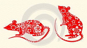 The rat is a symbol of the Chinese New Year 2020. Red is decorated with patterns and flowers on a background of rice