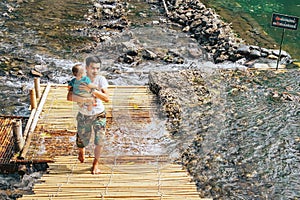 RATCHABURI THAILAND-JANUARY 19,2020 : Unidentified people come to visit, relax and swim in the stream at Ohpoi Market on january19