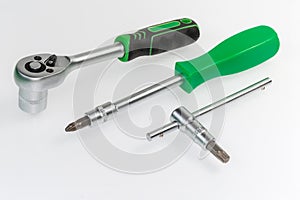 Ratchet wrench with socket, nut driver, T-handle with bits