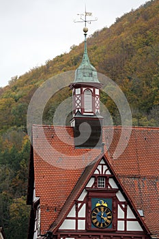 Rathouse with clock on the Marktplatz square in Bad Urach, Germany