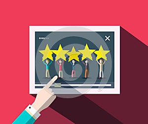 Rating Concept with Human Hand on Screen with People Holding Stars