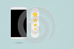 Rating stars on white paper cut with smartphone for customer   rating  , Review, Service evaluation, satisfaction, Customer