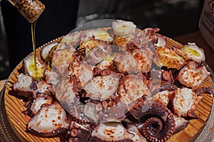 Ration of pulpo Ã¡ feira in the typical wooden plate