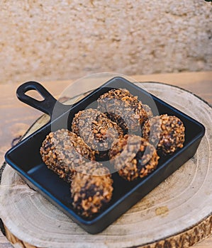 Ration of typical Spanish croquettes stuffed with chicken and seafood