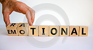 Rational or emotional symbol. Psychologist turns wooden cubes and changed the word `rational` to `emotional`. Beautiful white