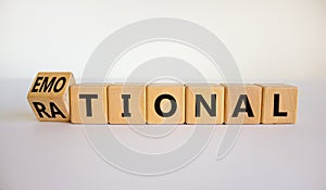 Rational or emotional symbol. Turned wooden cubes and changed the word `rational` to `emotional`. Beautiful white background. photo
