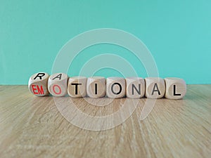 Rational vs emotional symbol. Turned wooden cubes