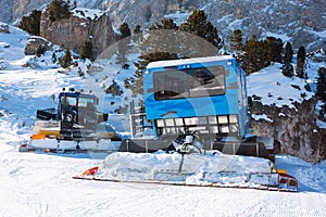 Ratrac machine for skiing slope preparations in the mountains. Snow groomers for ski slopes preaparation in winter