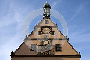 Ratstrinkstube facade with clock, date, coat of arms and sun dial photo