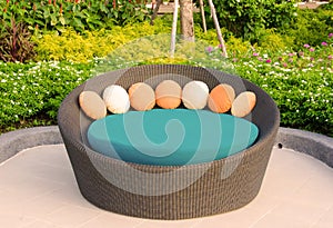 Rattan armchair furniture in garden