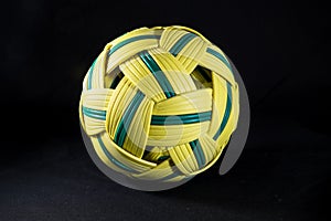 Rattan ball on black background