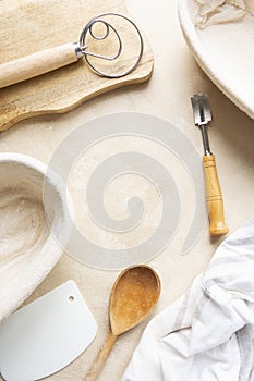 Rattan banneton, proofing basket for sourdough bread. Baking utensile. Basic set of baking bread at home. Copy space photo