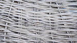 Rattan decorative furniture material close-up 4K 2160p 30fps UltraHD tilting footage - Natural wicker artificial