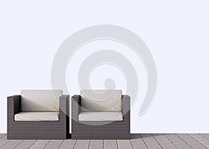 rattan garden furniture in the garden on concrete floor