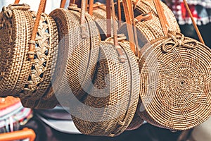 Rattan round bags at a street shop. Bali, Indonesia.