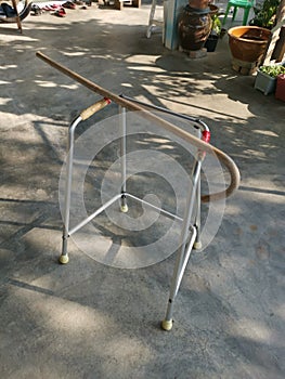 Rattan walking stick and stainless metal walker