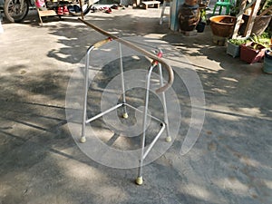 Rattan walking stick and stainless metal walker