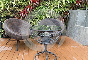 rattan wicker chair and desk on patio