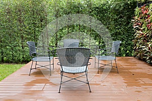 rattan wicker chair and desk on patio
