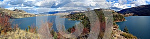 Landscape Panorama of Fall Colors at Rattlesnake Point jutting into Kalamalka Lake, Okanagan Valley, British Columbia photo
