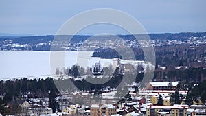 Church of Rattvik on lake Siljan in winter in Dalarna in Sweden photo