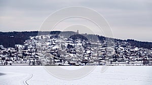 Rattvik town on frozen lake Siljan in Dalarna in Sweden