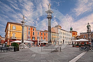 Ravenna, Emilia-Romagna, Italy: the main square Piazza del Popolo with the ancient columns with the statues of Saint Apollinare photo