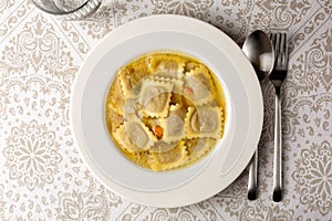 Ravioli in brodo. Fresh Meat italian dumplings, pasta with meat filling photo